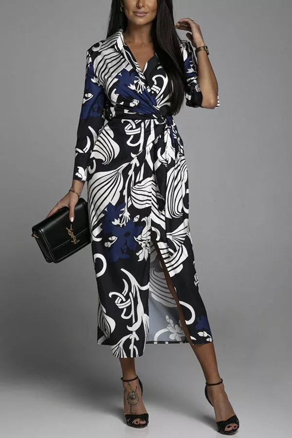 Celestina Mode - Elegant slå-om-kjole med høj slids