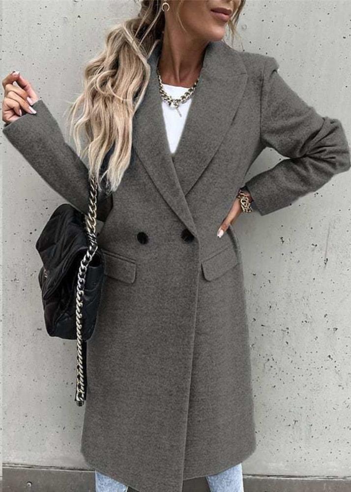 Asta dames klassisk frakke elegant med tidløst snit og dobbeltradet lukning, udstyret med bred krave og lommer, ideel til et sofistikeret og stilfuldt look til både hverdags- og formelle anledninger.