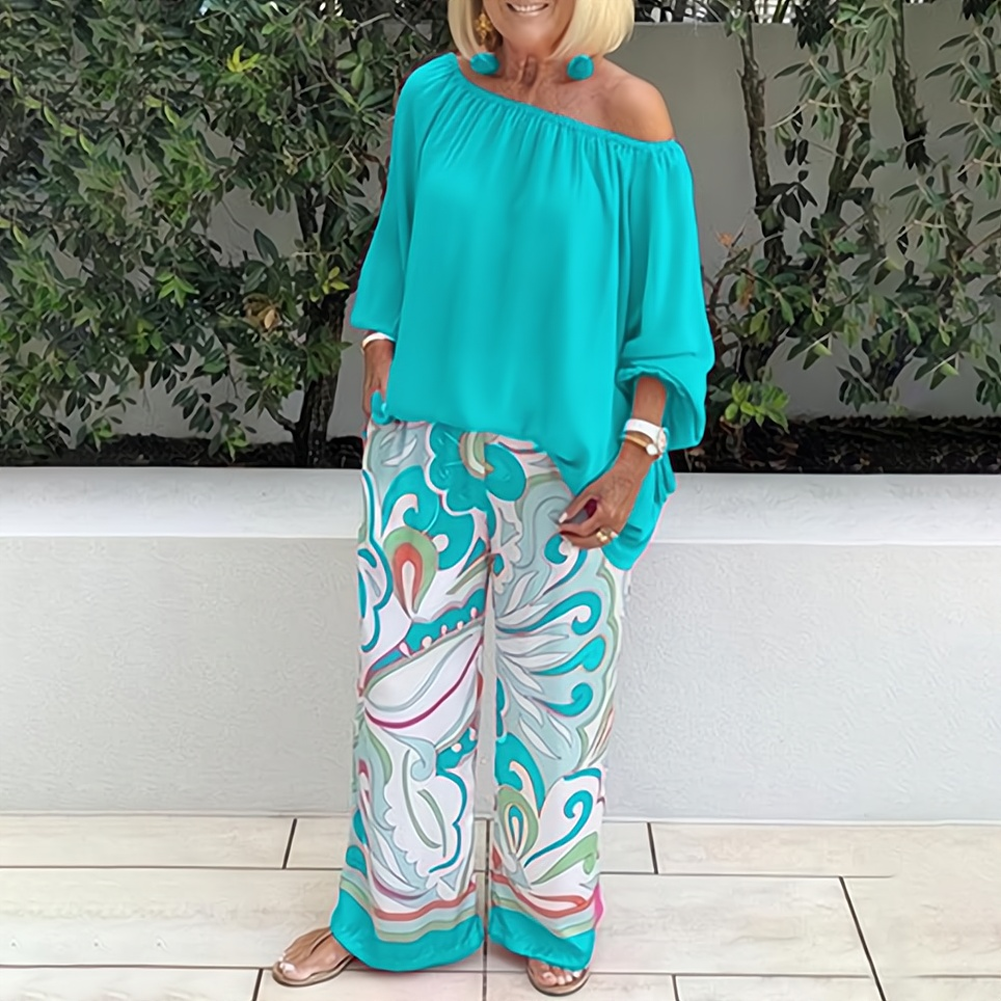 Elara - Stilfuld off-shoulder-bluse med brede bukseben