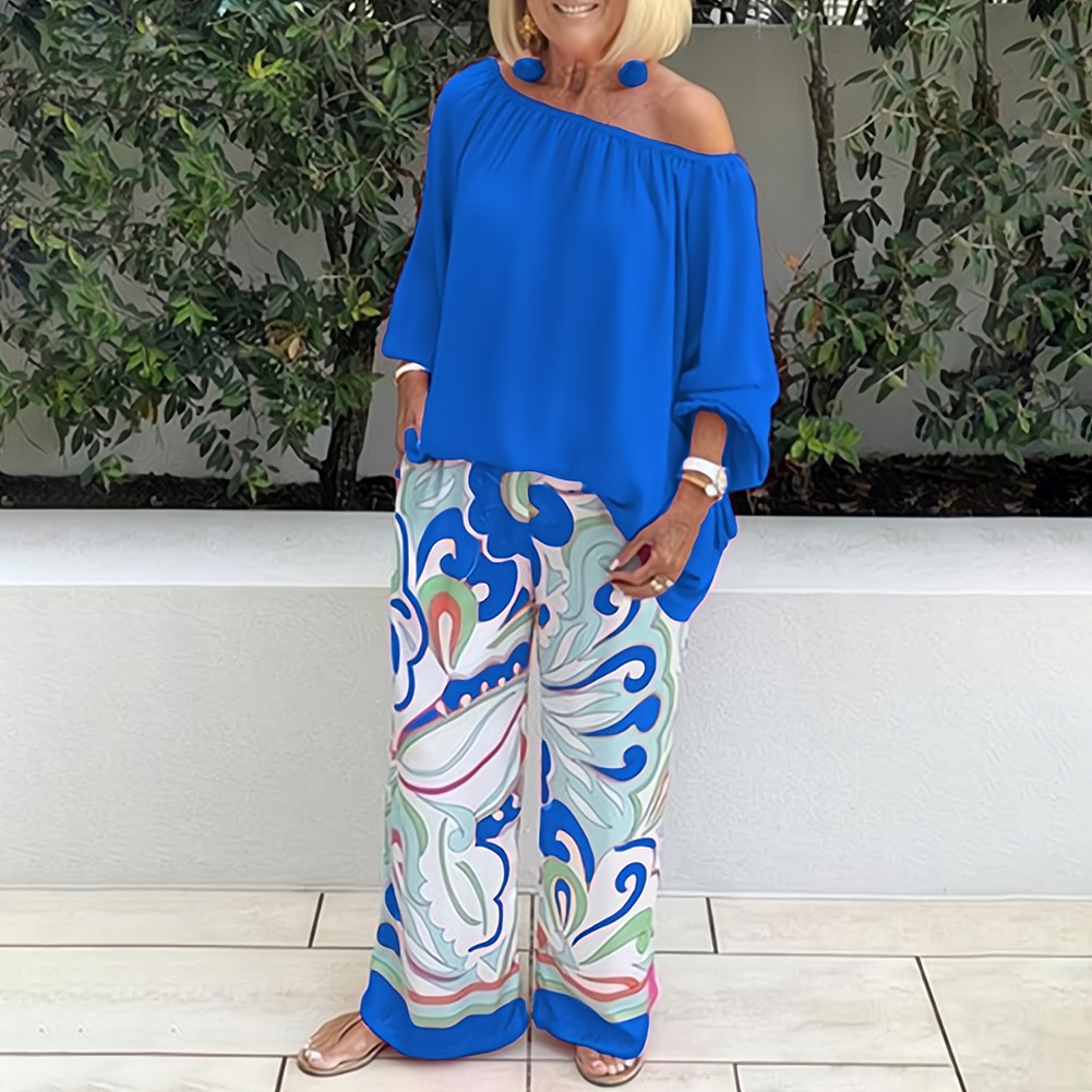 Elara - Stilfuld off-shoulder-bluse med brede bukseben